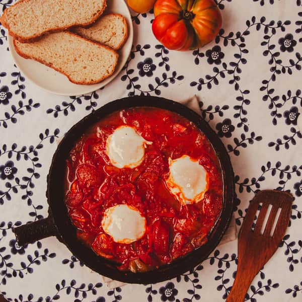 A cast iron cooking surface - a stand-in for the Lodge 15-Inch Cast Iron Pizza Pan, not a photograph of this model